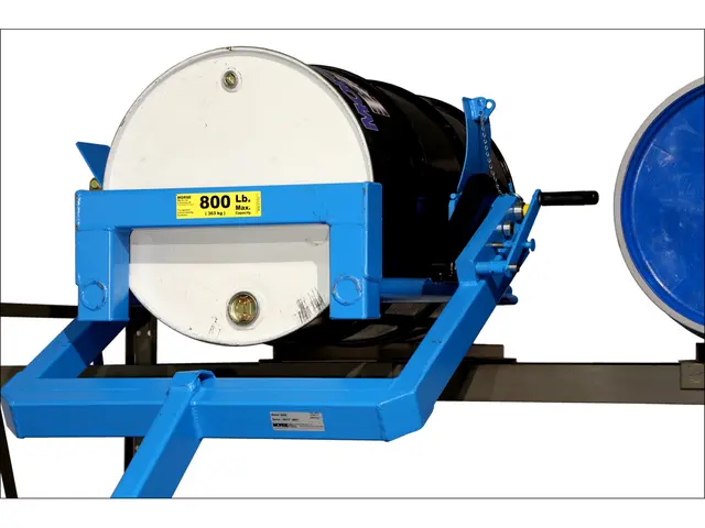 Place drum into rack - Model 405 with manual lift and tilt control